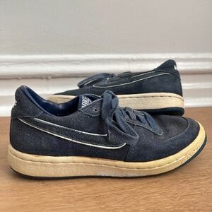 Unique retro throwback suede Adidas in a navy blue